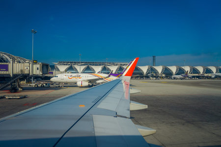 BANGKOK, THAILAND - FEBRUARY 01, 2018: Beautiful outdoor view of commercial aircraft wait for taking off at Bangkok international airport in Bangkok, Thailandのeditorial素材
