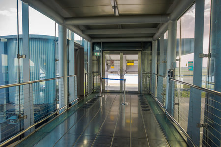 BANGKOK, THAILAND - FEBRUARY 01, 2018: Interior view of arrival hall surrounding of glasses at Don Mueang International Airportのeditorial素材