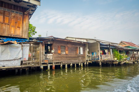 Floating poor house on the Chao Phraya river. Thailand, Bangkokの写真素材