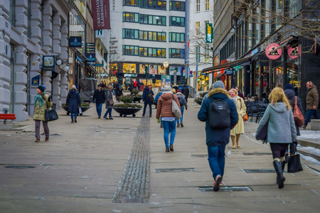 OSLO, NORWAY - MARCH, 26, 2018: Outdoor view of unidentified people walking in the streets of Oslo townのeditorial素材