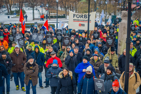 OSLO, NORWAY - MARCH, 26, 2018: Outdoor view of crowd of people at local protest in front of the Norwegian Parliament building, Stortingetのeditorial素材