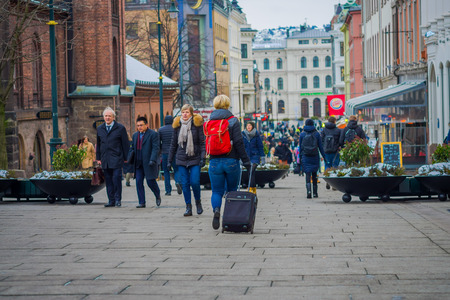 OSLO, NORWAY - MARCH, 26, 2018: Outdoor view of people walking in the streets of Oslo town, in Summer Late Eveningのeditorial素材
