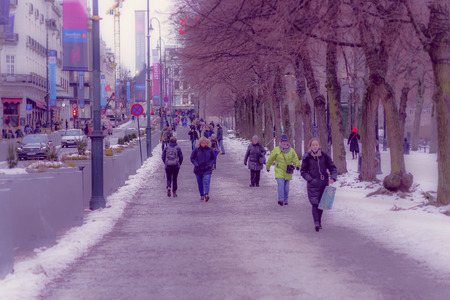 OSLO, NORWAY - MARCH, 26, 2018: Outdoor view of unidentified people walking in the streets of Oslo townのeditorial素材