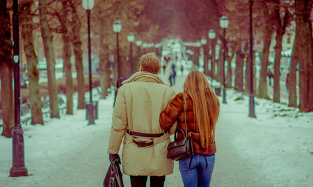 OSLO, NORWAY - MARCH 8, 2017: Outdoor view of unidentified couple inlove in Vigeland Park on a breezy winter dayのeditorial素材