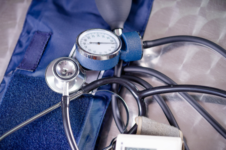 Close up of tensiometer over a metallic table with a stethoscope, medical conceptの写真素材