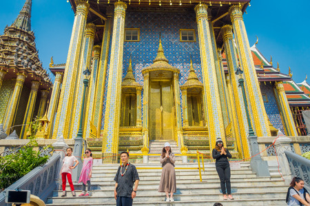 BANGKOK, THAILAND - FEBRUARY 01, 2018: Unidentified people at Wat Phra Kaew, Temple of the Emerald Buddha with blue skyのeditorial素材