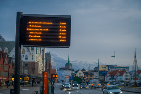 Bergen, Norway - April 03, 2018: Outdoor view of a blurred bus stop information arrivals in the streets of the city of Bergenのeditorial素材