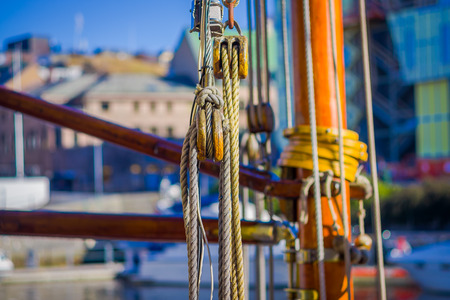 Detail view of ropes on boat in port of Alesund in Norwayの写真素材