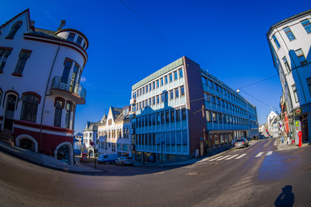 ALESUND, NORWAY - APRIL 04, 2018: Outdoor view of Alesund town and streets on the west coast of Norway, at the entrance to the Geirangerfjord, with a gorgeous blue skyのeditorial素材