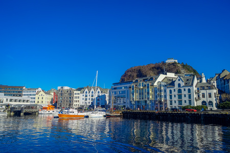 ALESUND, NORWAY - APRIL 04, 2018: Beautiful summer view of Alesund port town on the west coast of Norway, at the entrance to the Geirangerfjordのeditorial素材