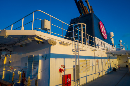 ALESUND, NORWAY - APRIL 04, 2018: Outdoor view of Hurtigruten voyage in cruise along Norwegian coastのeditorial素材
