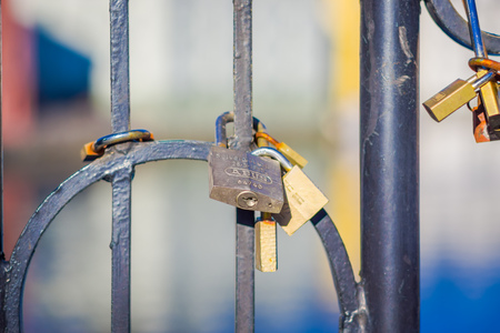 ALESUND, NORWAY, APRIL, 04, 2018: Close up of dozens of padlocks of love on the bridgeのeditorial素材