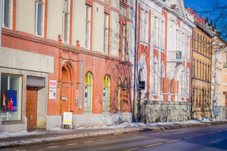 TRONDHEIM, NORWAY - APRIL 04, 2018: Colorful buildings on streets of Trondheim, Norway. Scandinavian style of architectureのeditorial素材