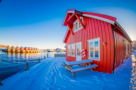 SVOLVAER, LOFOTEN ISLANDS, NORWAY - APRIL 10, 2018: Beautiful rorbu or fishermans houses in Svolvaer Lofoten Islandsのeditorial素材