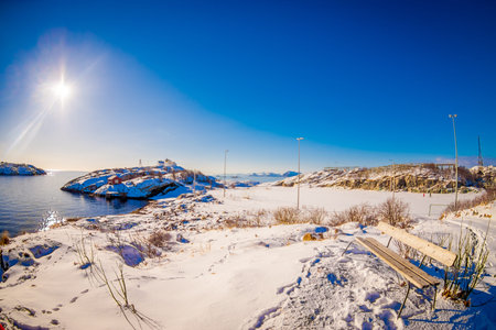 Beautiful sunny day on the frozen bay of Henningsvaer