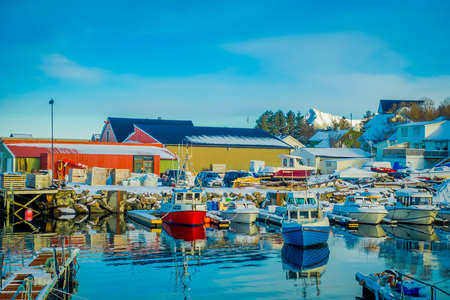 Henningsvaer, Norway - April 04, 2018: Outdoor view of small fishing boats in a fishing port on Lofoten islandsのeditorial素材
