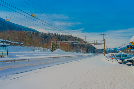 GOL, NORWAR, APRIL, 02, 2018: Gorgeous outdoor view of cable lines of railway used for train transportation in the city of Golのeditorial素材