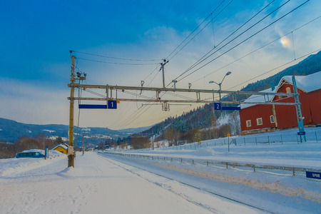 GOL, NORWAR, APRIL, 02, 2018: Gorgeous outdoor view of cable lines of railway used for train transportation in the city of Golのeditorial素材