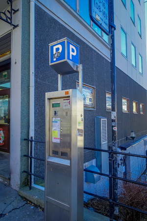 ALESUND, NORWAY - APRIL 04, 2018: Outdoor of a parking machine located in the harbour in the streets of Alesund town on the west coast of Norwayのeditorial素材