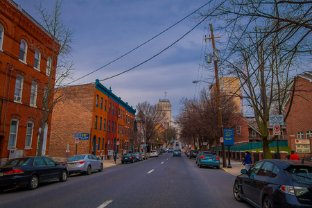 LANCASTER, USA - APRIL, 18, 2018: Outdoor view of cars parked at one side of the road with some downtown Lancaster, Pennsylvaniaのeditorial素材