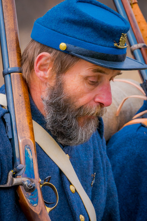 MOORPARK, USA - APRIL, 18, 2018: Portrait of old man wearing uniform and holding a gun in his shoulder, at the Civil War Reenactment in Moorpark, the largest battle reenactmentのeditorial素材