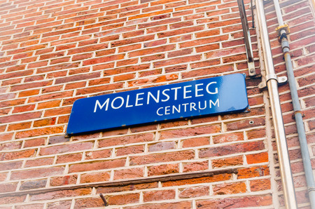 AMSTERDAM, NETHERLANDS, APRIL, 23 2018: Outdoor view of name of the street over a brick wall located in the streets of dowtown in Amsterdamのeditorial素材