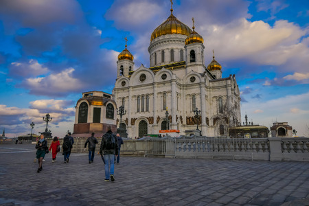 MOSCOW, RUSSIA- APRIL, 24, 2018: People walking close to Church of the Savior Cathedral of Resurrection of Christ . It is an architectural landmark and a unique monument to Alexander IIのeditorial素材
