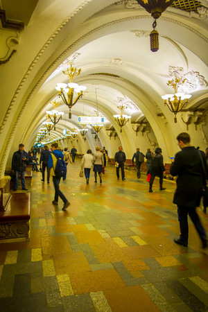 MOSCOW, RUSSIA- APRIL, 29, 2018: Unidentified people walking inside of Beautifully decorated metro station Arbatskaya, in Moscowのeditorial素材