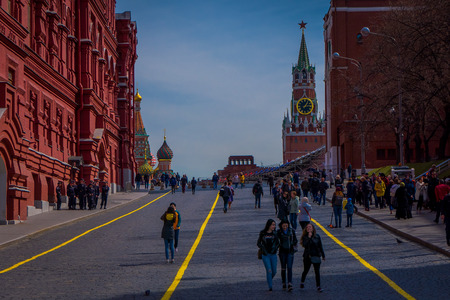 MOSCOW, RUSSIA- APRIL, 24, 2018: Below view with people walking in the streets and the building of the State Historical Museum on red square in Moscowのeditorial素材