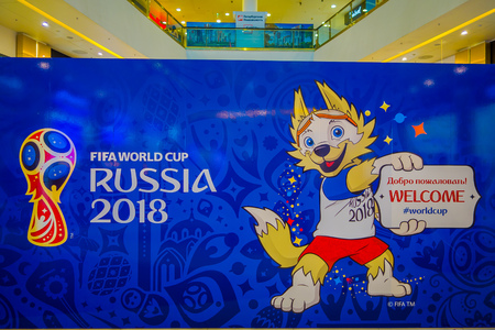 ST. PETERSBURG, RUSSIA, 02 MAY 2018: The official mascot of the 2018 FIFA World Cup wolf Zabivaka on the theatrical square Park of football holding a welcome sign in the pictureのeditorial素材