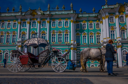 ST. PETERSBURG, RUSSIA, 01 MAY 2018: Outdoor view of Tsar Horse Carriage in front of Winter Palace Landmark Tourist Attraction at daytime, Hermitage Museum, Palace squareのeditorial素材