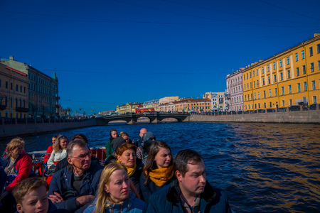 ST. PETERSBURG, RUSSIA, 02 MAY 2018: Outdoor view of many tourist in a boat trip along the Moyka River. St. Petersburgのeditorial素材