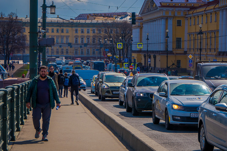 ST. PETERSBURG, RUSSIA, 01 MAY 2018: Outdoor view of two beautiful russian women taking a selfie with a gorgeous Peter and Paul Fortress in the horizont in St. Petersburgのeditorial素材