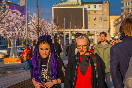 MOSCOW, RUSSIA- APRIL, 24, 2018: Unidentified tourists walking and enjoying the gorgeous sunny day at Manezhnaya Square decorated for the celebration of Easter with a Pink treeのeditorial素材