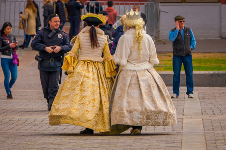 MOSCOW, RUSSIA- APRIL, 29, 2018: Outdoor view of unidentified women wearing gorgeous colonial dress and walking in the Manezhnaya square, Moscowのeditorial素材