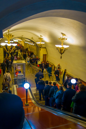 MOSCOW, RUSSIA- APRIL, 29, 2018: Unidentified people using a modern escalator in Moscow metroのeditorial素材
