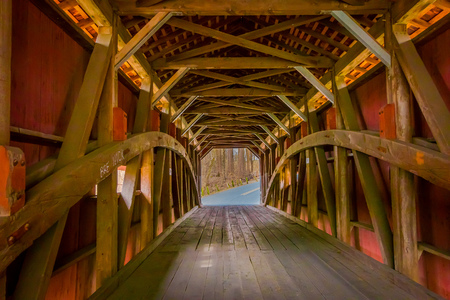 Pennsylvania, USA, APRIL, 18, 2018: Indoor view of details of red covered bridge inside of the forest in Lancasterのeditorial素材