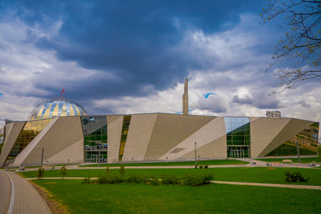 BELARUS, MINSK - MAY 01, 2018: Facade of Belarusian Great Patriotic War Museum and monument, sunny dayのeditorial素材