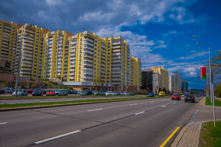 MINSK, BELARUS - MAY 01, 2018: Outdoor view of complex buildings ith some cars and traffict at the central street of independence Avenue prospect Nezavisimosti in the center of Minskのeditorial素材