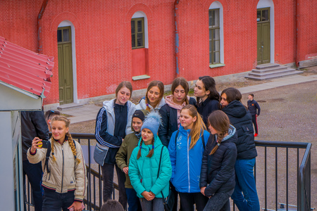ST. PETERSBURG, RUSSIA, 17 MAY 2018: Unidentified teenagers taking selfies in St. Petersburg in a gorgeous sunny dayのeditorial素材