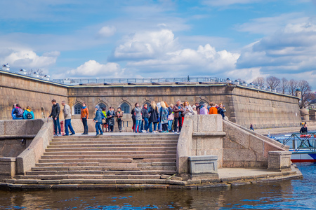 ST. PETERSBURG, RUSSIA, 17 MAY 2018: Unidentified people walking at Nevsky gate of Peter and Paul fortress. A monument of architecture of classicism in St. Petersburgのeditorial素材