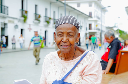 POPAYAN, COLOMBIA - FEBRUARY 06, 2018: Portrait of gorgeous colombian black women smiling and...