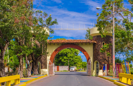 GRANADA, NICARAGUA, MAY, 14, 2018: Beautiful outdoor view of stoned arch located at the enter of the...