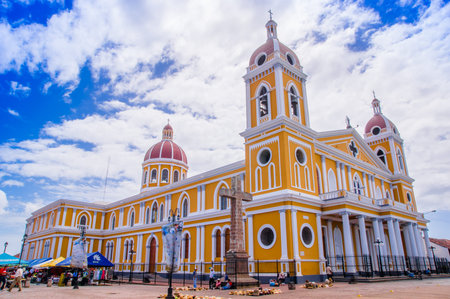 GRANADA, NICARAGUA, MAY, 14, 2018: Outdoor view of Catedral de Granada beautifully decorated in...