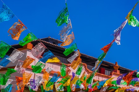 Below view of San Cristobal de las Casas with numerous religious flagsの写真素材