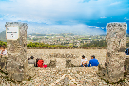 OTAVALO, ECUADOR - MAY 29, 2018: Outdoor view of unidentified people enjoying the show in the flight platform used for acrobacies of the different birds as eagles at the Condor Park in Otavaloのeditorial素材