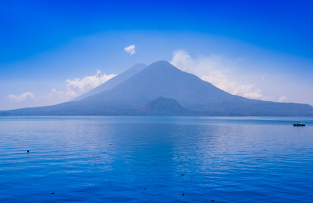Beautiful landscape of Atitlan Lake, is the deepest lake in all of Central America with a maximum depth of about 340 meters, with volcano in Background in Guatemala.の写真素材