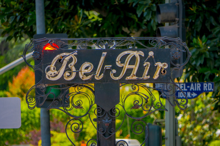 Los Angeles, California, USA, JUNE, 15, 2018: Outdoor view of Bel Air sign in a metallic structure with a building background defocusedのeditorial素材