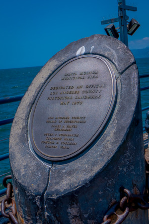 Los Angeles, California, USA, JUNE, 15, 2018: Close up of stoned monument with a short leyend of historical landmark in may 1975 in the pier in Santa Monica Beach in California USAのeditorial素材