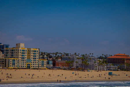 Los Angeles, California, USA, JUNE, 15, 2018: Outdoor view of Santa Monica State Beach, in the back residential buildings, Santa Monica Pier and the mountainsのeditorial素材